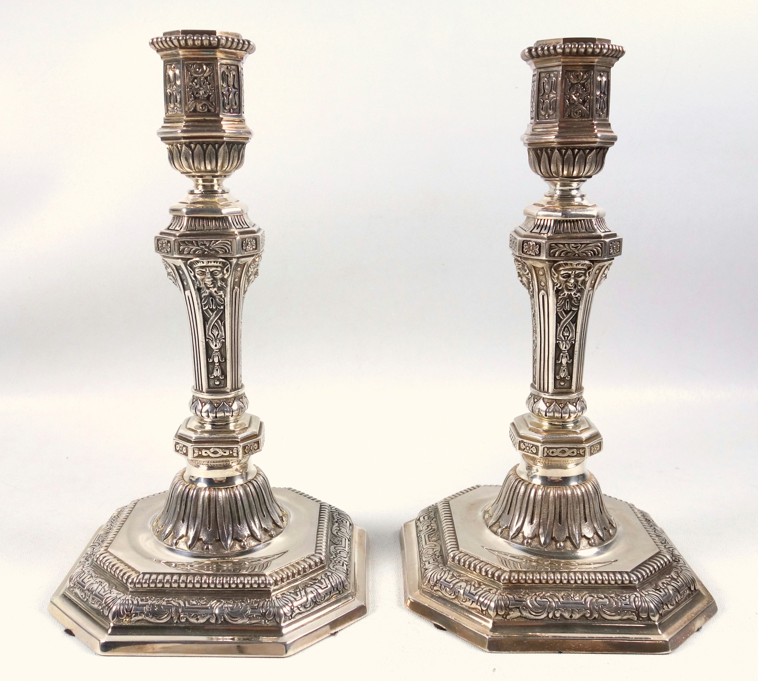 Good pair of French Louis XVI style silver plated candlesticks, each with an octagonal baluster