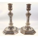 Good pair of French Louis XVI style silver plated candlesticks, each with an octagonal baluster