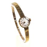 Certina ladies 9ct gold bracelet watch with a circular white dial with baton markers enclosing a