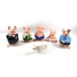 Family of five Natwest Wade pigs, Beswick pig W17cm, ceramic foal W21cm, two ceramic owl book ends