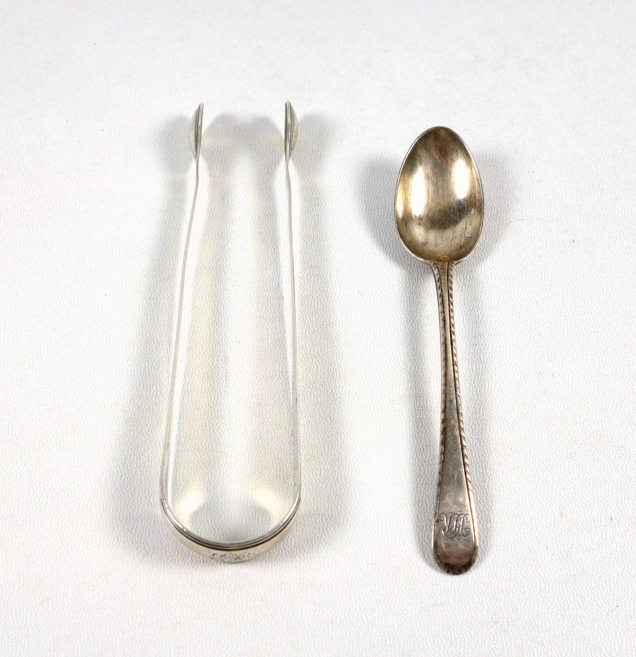 George III silver bright cut tea spoon; sugar tongs, by Peter & Ann Bateman London 1794; child's - Image 2 of 4
