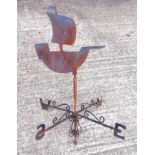Old cast iron weather vane surmounted by a stylised sailing ship, H.93.5cm