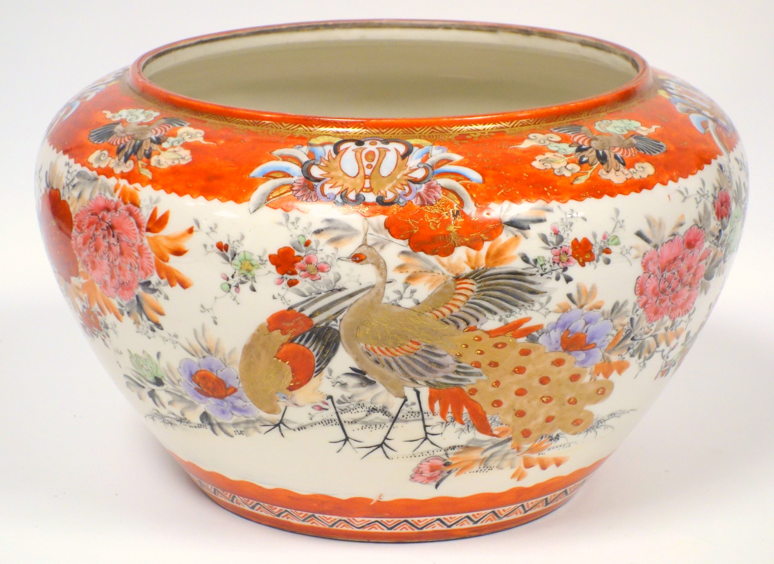 Late 19th century Japanese Kutani porcelain circular bowl painted with peacocks, other birds and