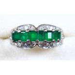 White metal ring set 6 trap cut emeralds and diamonds, stamped 585, gross 5grs