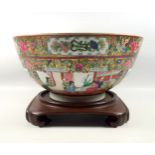 A large Chinese Canton Famille Rose and gilt punch bowl, with all round peonies and floral patterns,