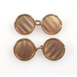 Pair of 9ct gold engine turned disc cufflinks, dated on the reverse "15.10.24", 5.9grs