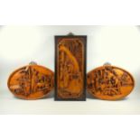 Three Oriental carved wood wall panels depicting court scenes, two ovular 39.5cm, one rectangular