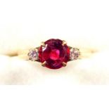 Yellow metal ring set ruby and 2 diamonds, stamped "14K" and "Alex", gross 2.9grs (chip, scratches