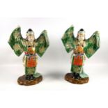 Pair of Japanese ceramic dancing figures, with green and celadon crackle glaze and painted