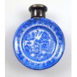 Late Victorian ceramic scent bottle with blue and white willow pattern dished sides, and a silver