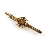Late Victorian gold bar brooch with and openwork roundel set diamond, with bead decoration, L5cm,