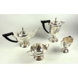 Near Eastern white metal 4 piece tea and coffee set comprising a teapot of tapering circular form,