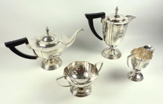 Near Eastern white metal 4 piece tea and coffee set comprising a teapot of tapering circular form,