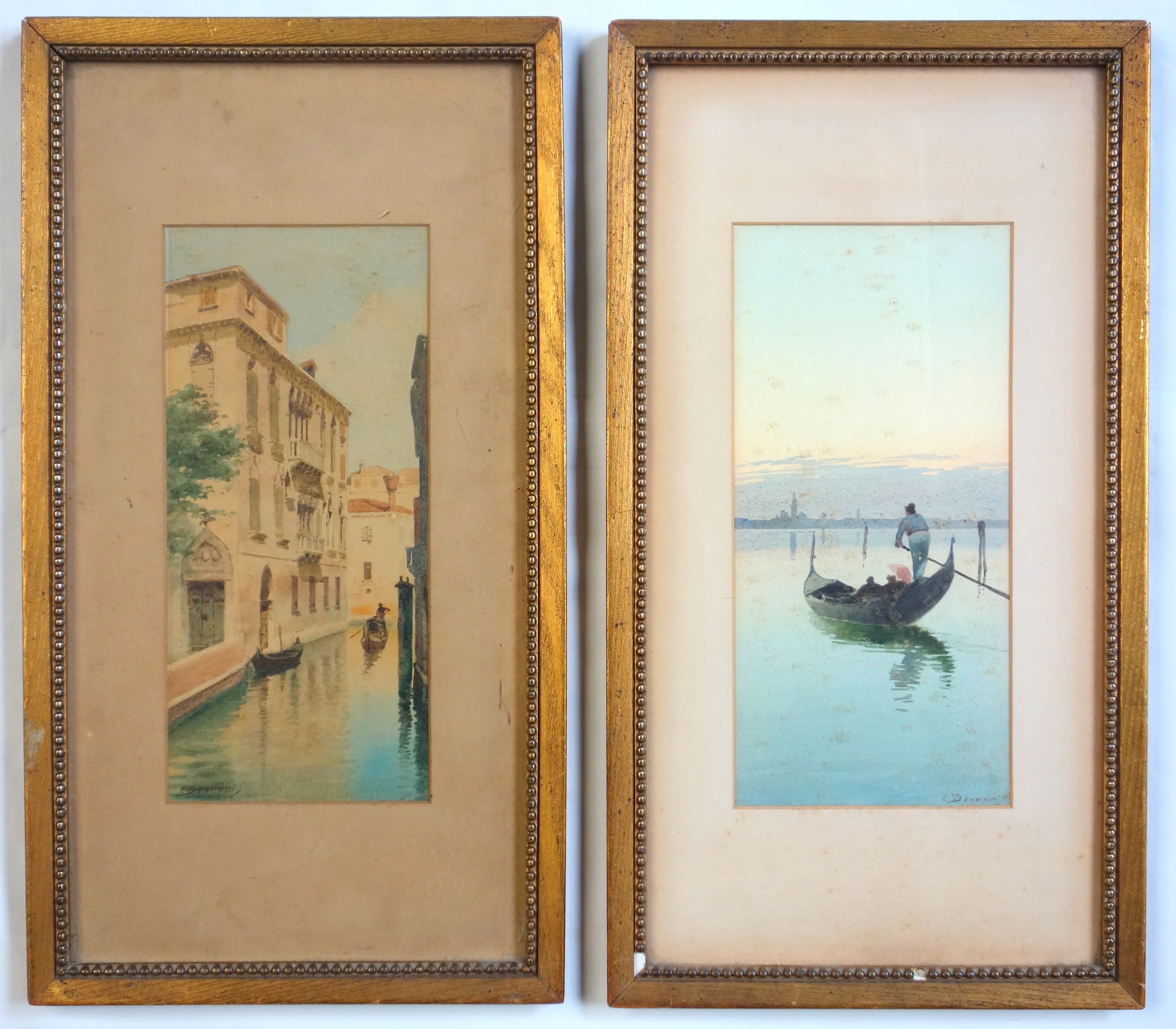 Eugenio Benvenuti (1881-1959) A pair of Venetian scenes with gondoliers, signed, watercolours, 28
