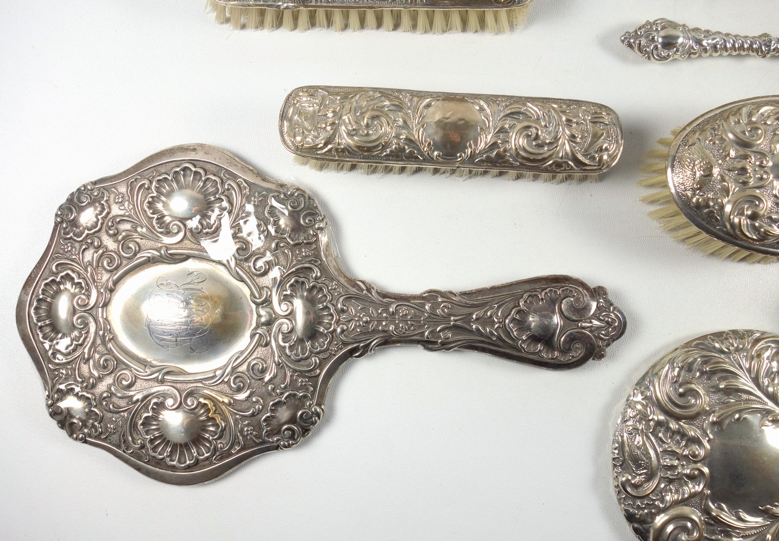 Edwardian 5 piece silver mounted dressing table set with embossed floral decoration and monogram, - Image 3 of 5