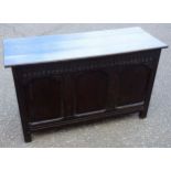 Victorian elm chest with a hinged top, chip-carved frieze and 3 panelled front, 66 x 109 x 42.5cm