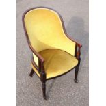 Regency mahogany tub shaped armchair with a reeded high back, arms and bow fronted, upholstered in