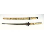 Japanese Wakizashi sword with single edged blade and sectional carved bone (possibly deer)