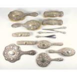 Edwardian 5 piece silver mounted dressing table set with embossed floral decoration and monogram,