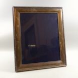 Silver rectangular photograph frame with a reeded and ribbon rim, by R Carr, Sheffield, 1995, 32 x