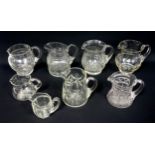 3 cut glass baluster jugs, and 5 other jugs. (8)