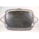 Large Edwardian silver tray with twin handles, gadrooned rim with shells by William Hutton and
