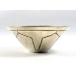 Contemporary hammered silver conical bowl with an impressed geometric design by Charles F Hall,