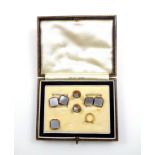 9ct gold and mother-of-pearl dress set comprising a pair of cufflinks, 2 studs and a button, gross