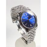 Bulova gentleman’s stainless steel bracelet watch with a circular blued dial, sweep seconds hand,