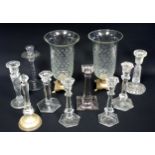 Pair of cut glass storm candleholders on metal bases, H.28.7cm; 2 cut candlesticks, 6 other