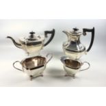 Late George V four piece tea set comprising teapot, hot water jug, H.23.5cm overall (marks