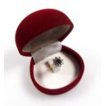 18ct gold sapphire and white stone child's ring, size G1/2, gross 3.6 grams.