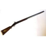 Hunting musket with a L.85cm octagonal steel barrel and percussion action, walnut stock with ram rod