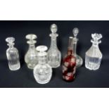 6 Victorian and later cut glass wine decanters, with stoppers, including one by Stuart, and a French