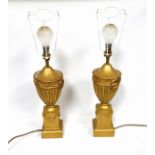 Pair of David Hunt gilt fluted urn table lamps, each on a square plinth, H.40.5cm. (2)