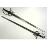 Near pair of Spanish Toledo Steel double edged swords, each with a wire bound hilt and scroll