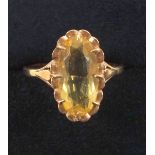 Yellow metal ring set oval cut citrine, size P1/2 - Q, 14 x 7mm, stamped "J H 9ct" and "2236 M",