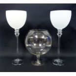 Pair of decorative tall frosted glass goblets, H.54.3cm; and a large balloon glass, H.36.5cm. (3)