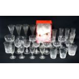 A large bubble glass goblet with a campana shape bowl, H.21cm; 4 1920s champagne flutes; set of 6