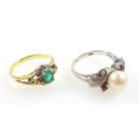 White metal ring set cultured pearl and 2 rubies, stamped "14K", size K1/2 - L, gross 4grs, and