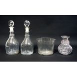 Pair of Georgian glass "Prussian" decanters, faintly lettered "Brandy" and "Rum", with associated
