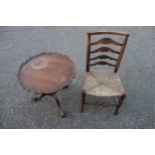 Victorian Yorkshire ash ladderback chair with a rush seat, and a mahogany pie crust top table, on