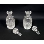 Pair of Waterford spirit decanters with cut panelling and lattice decoration, with matching