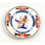 Early 19th century Chinese plate with blue, red, and gilt floral decoration, (chip to rim), Dia.22.