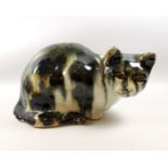 3 Winstanley cats, largest of a crouching tortoiseshell cat, L.28cm approx. (3)