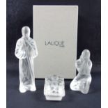 Lalique Nativity set of Mary, H.8.5cm, Joseph, H.12.5cm and the Baby Jesus, L.5.4cm, all with