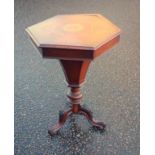 Victorian hexagonal walnut "trumpet" shaped work table with a floral inlaid hinged top disclosing