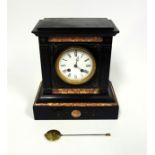 Victorian black slate and marble mantle clock, with white enamel dial, enclosing an 8 day movement