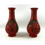 Pair of Chinese cinnabar lacquer baluster vases, each with carved floral decoration, H.30.5cm. (2)