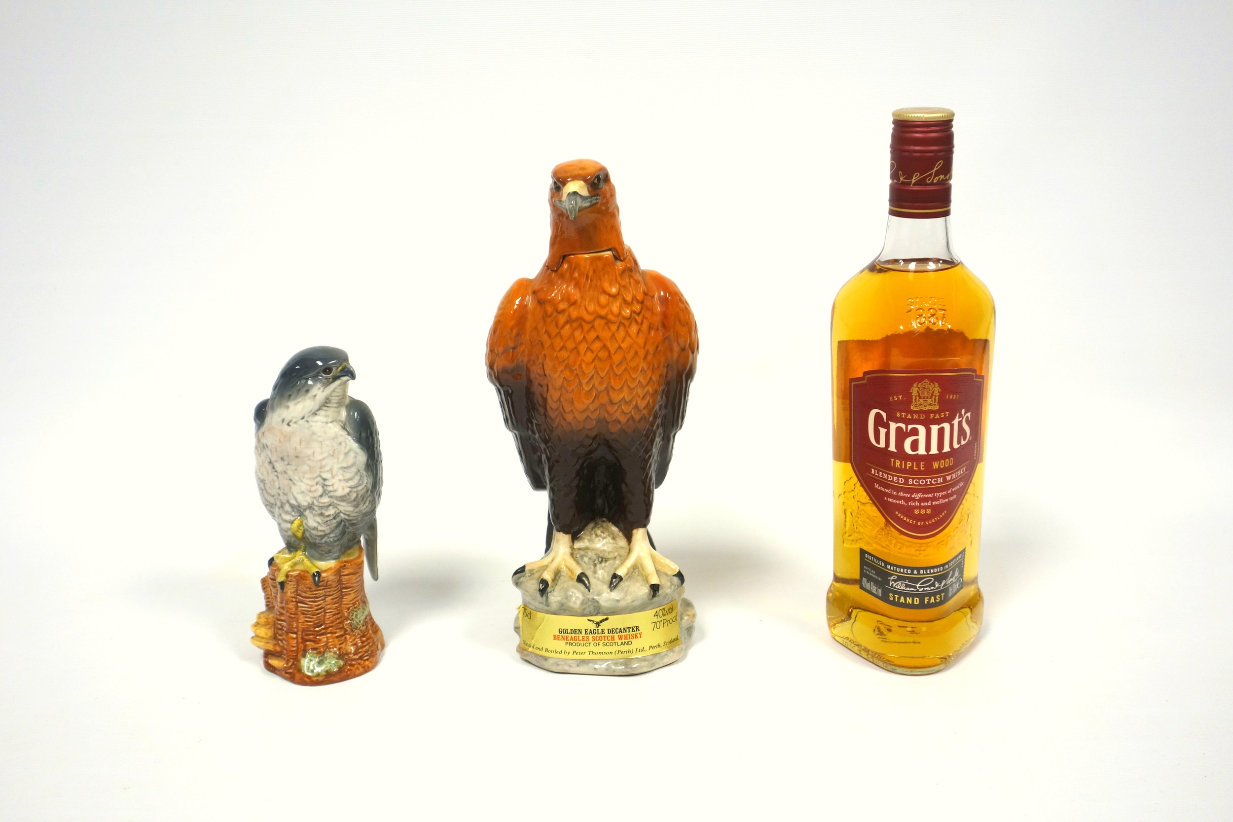 2 Beswick Beneagles scotch whisky ceramic decanters, "Golden Eagle", 75cl, with detachable head,